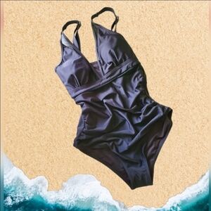Elegant Black One-Piece Swimsuit - Deep V-neck Design